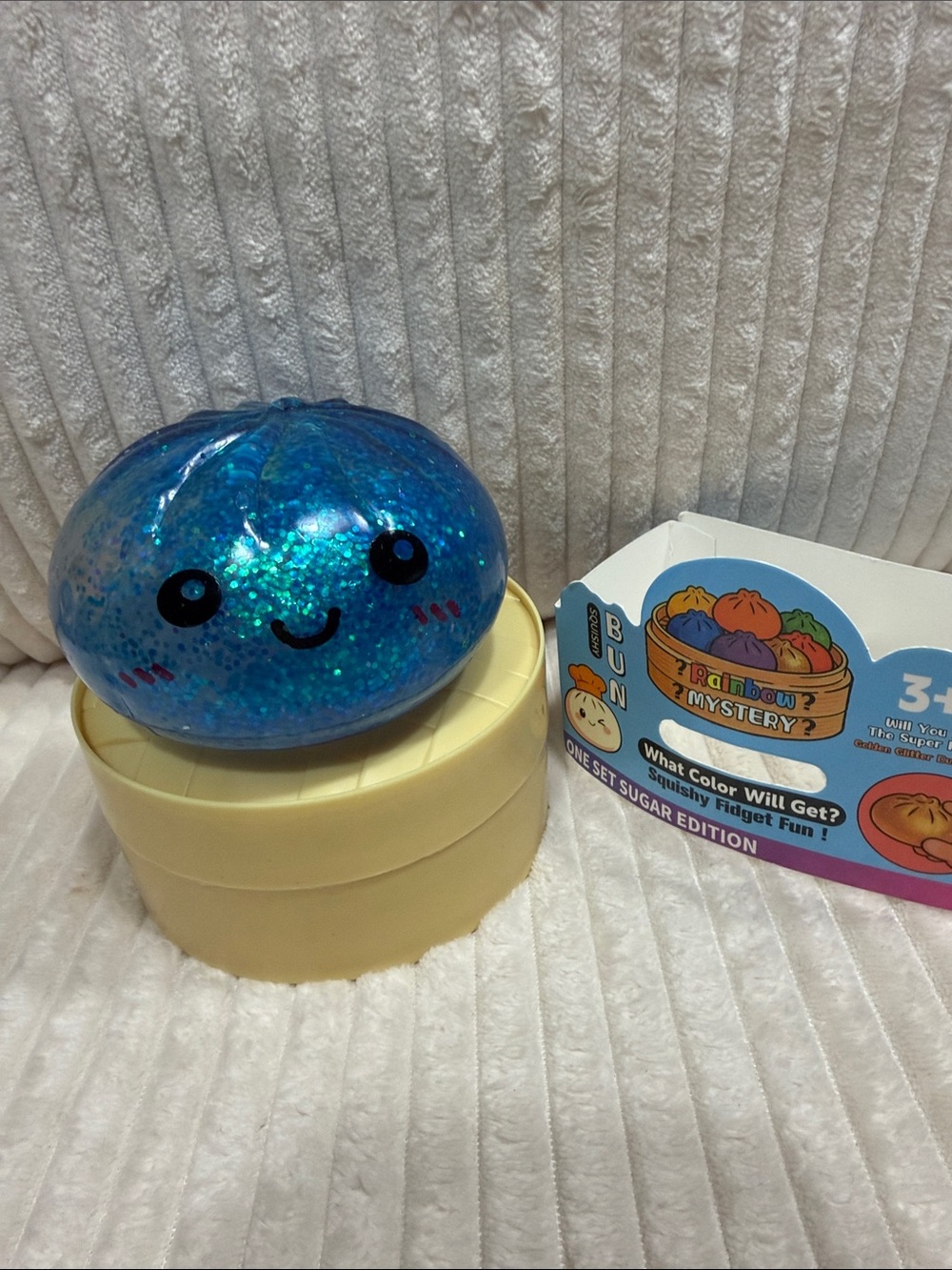 Blue Sparkle Glitter Squishy Sugar Bun. New in package. Soft squish. Verified.